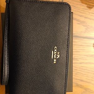 Navy blue Coach wristlet